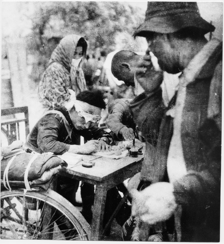 Police officer filling in a disaster certificate